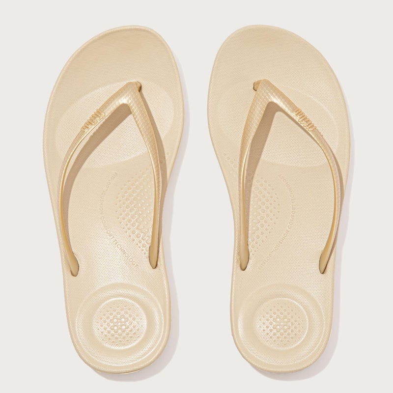 FitFlop Women's iQushion Rubber Flip-Flops with Contoured Footbed for Walking, Lightweight Ergonomic Flip Flop Sandals with Arch Support and Foot Impact Pillows, Gold, 8 US Women - Image 4
